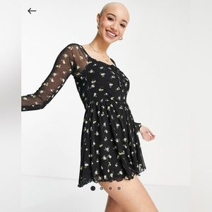 ASOS DESIGN long sleeve mesh picot trim romper in yellow micro floral